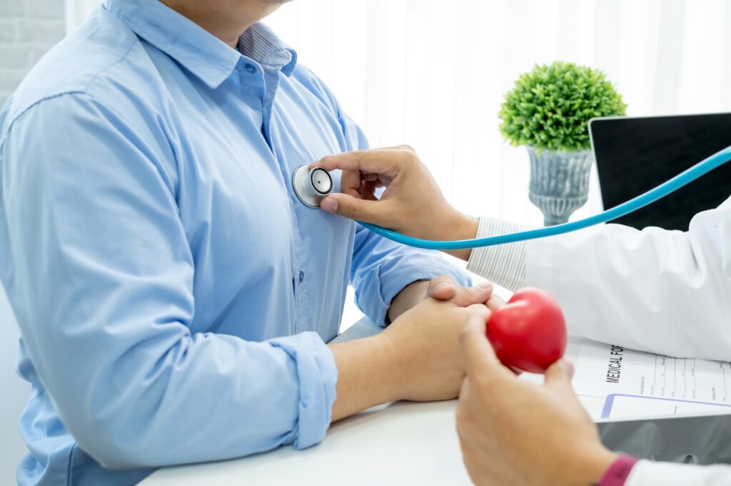 Doctor check heart disease male patient at the hospital. Heart disease treatment concept.