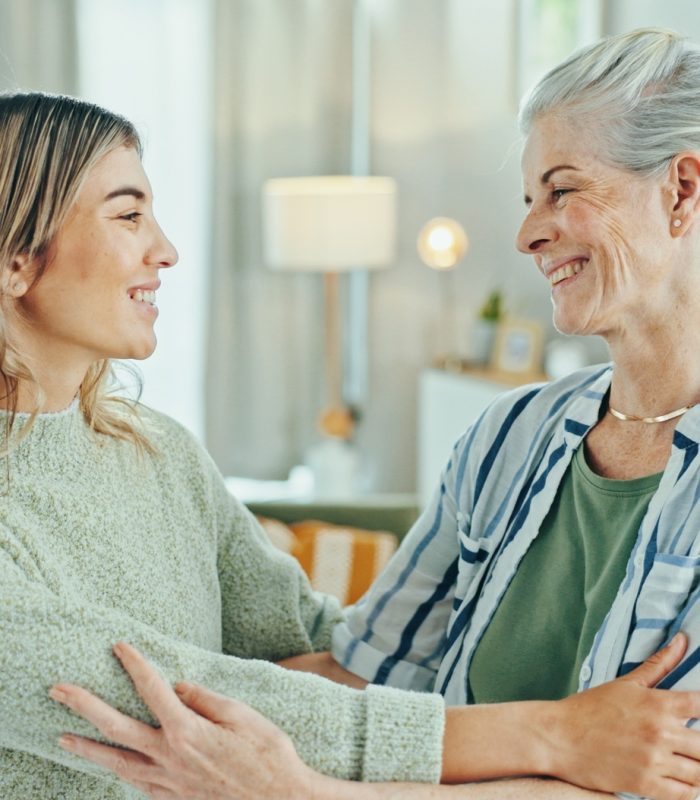 Senior woman, caregiver and hug with empathy for healthcare, comfort and treatment in elderly care